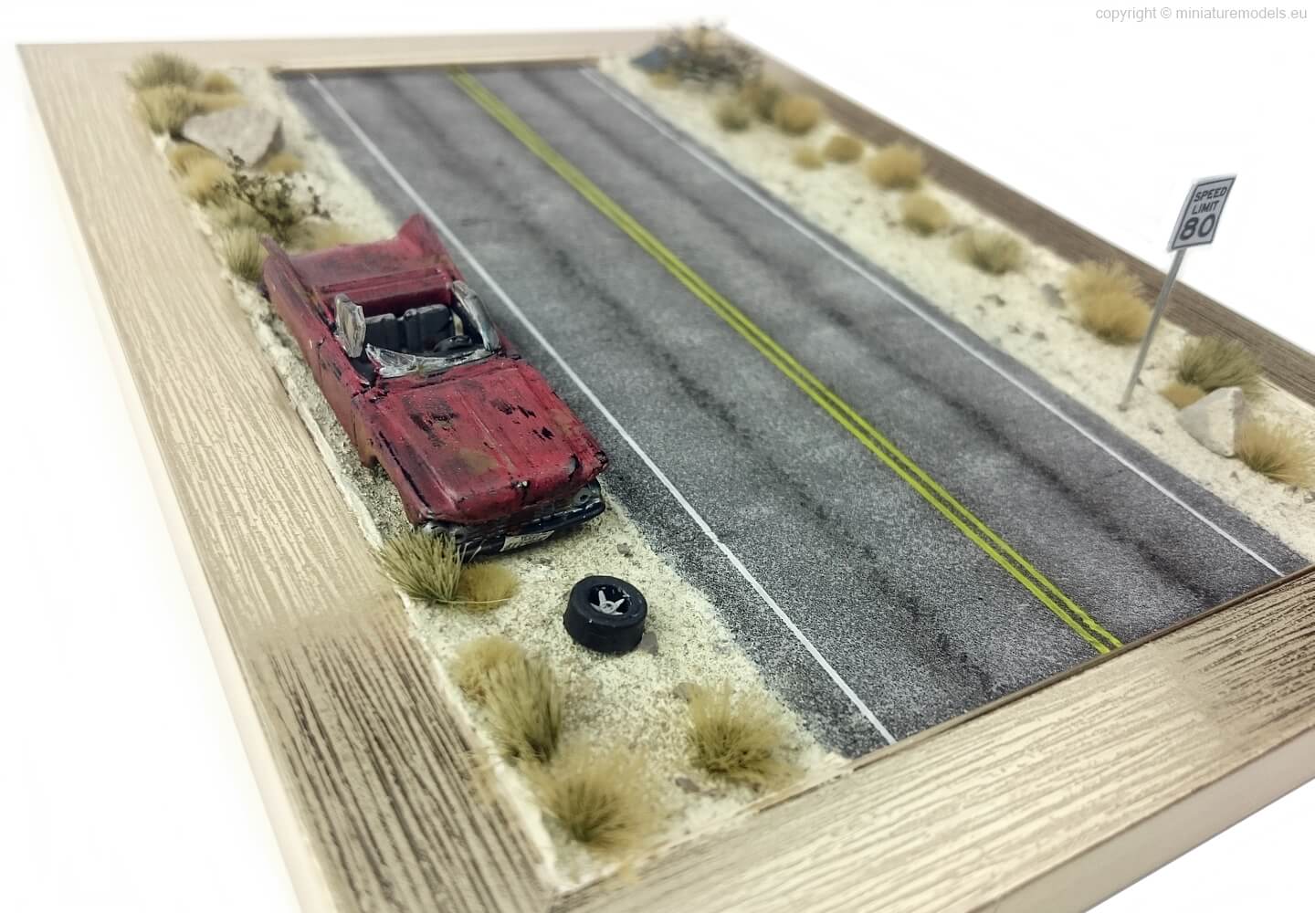 Model of car wreck on the road - diorama