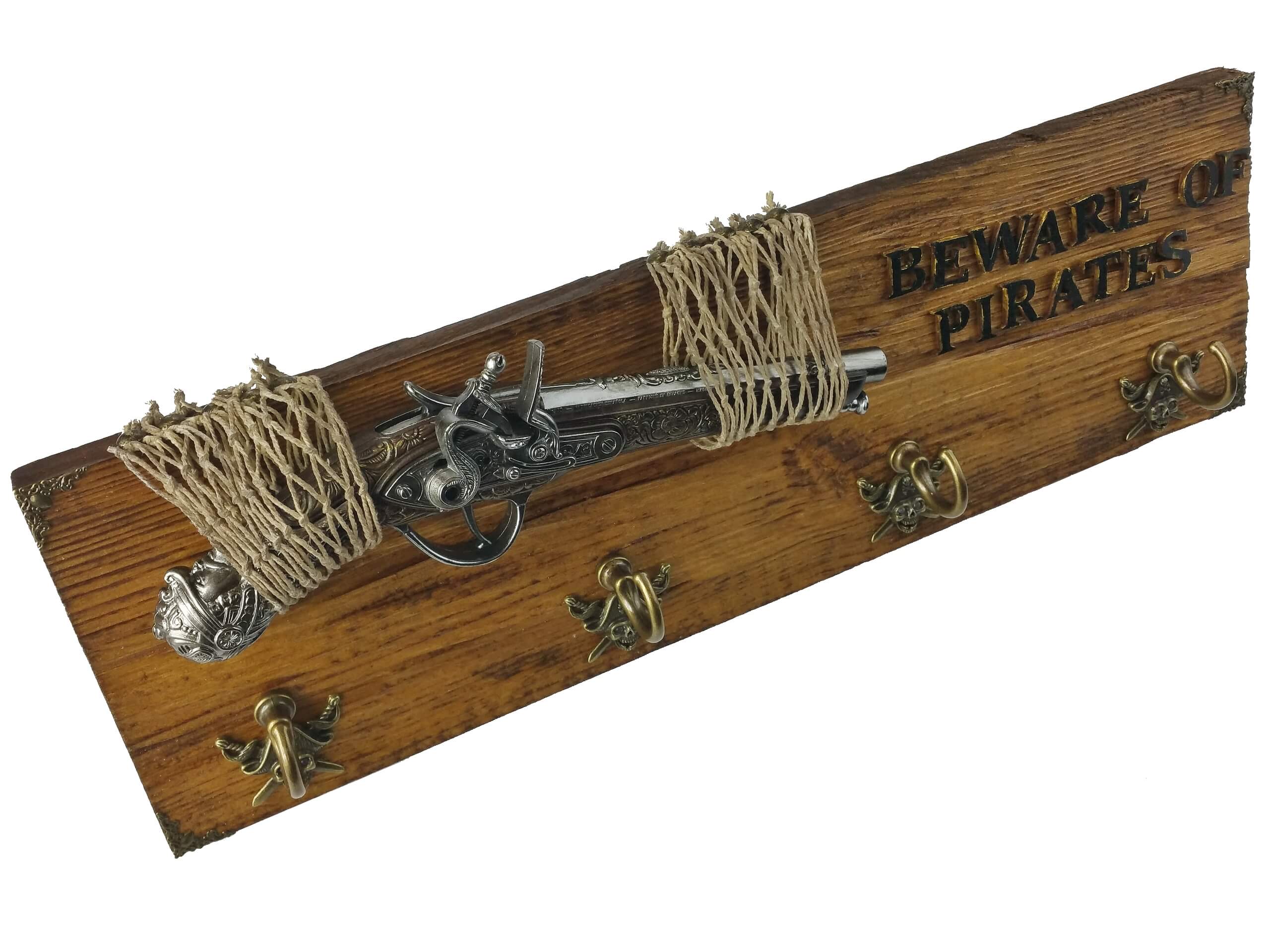 Wooden coat rack with pirate pistol